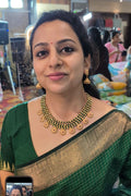 short green coin necklace