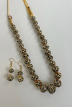 Lak mala with fitted zirconium