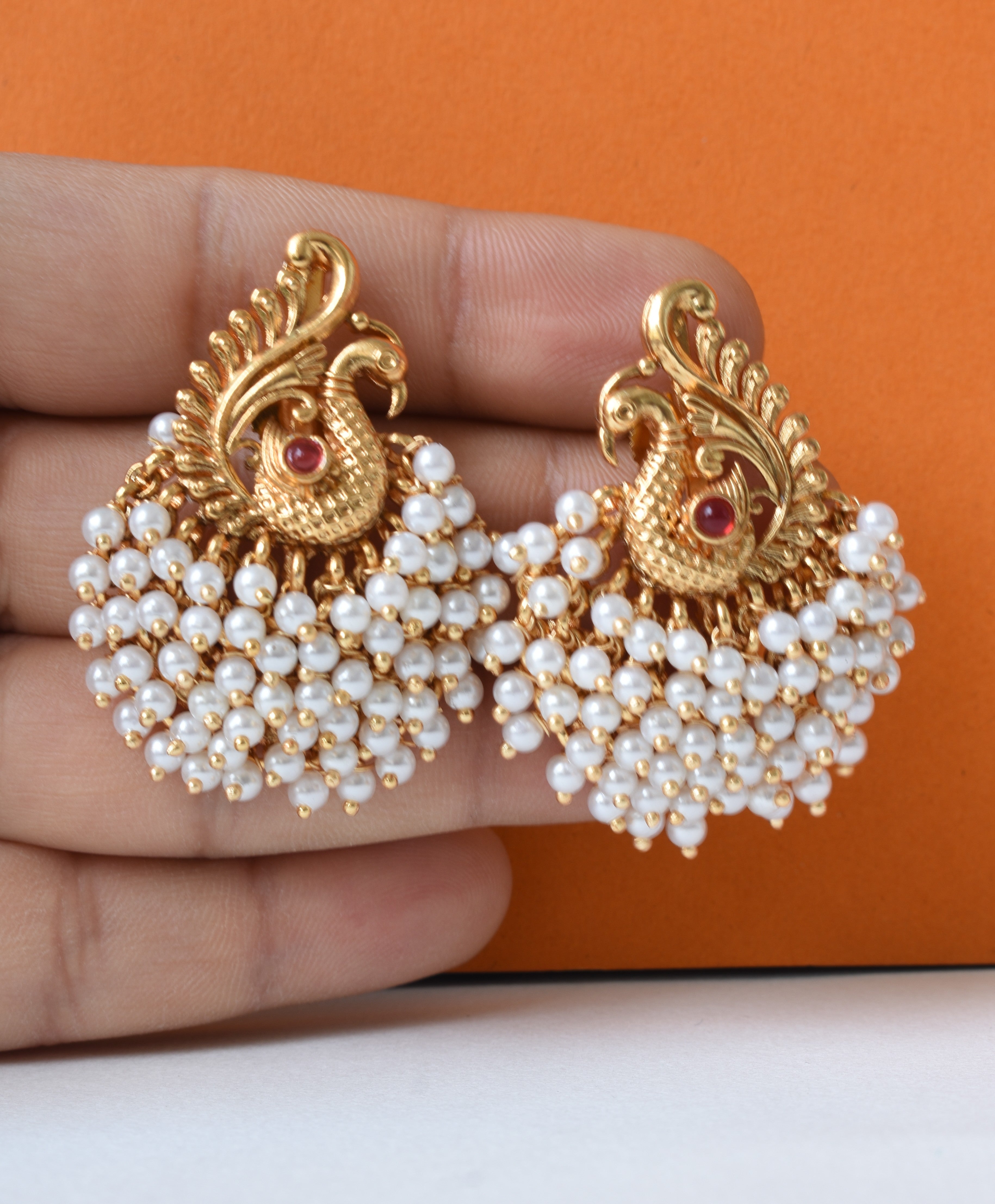 Temple-Inspired Peacock Motif Stud Earrings with Pearl Clusters