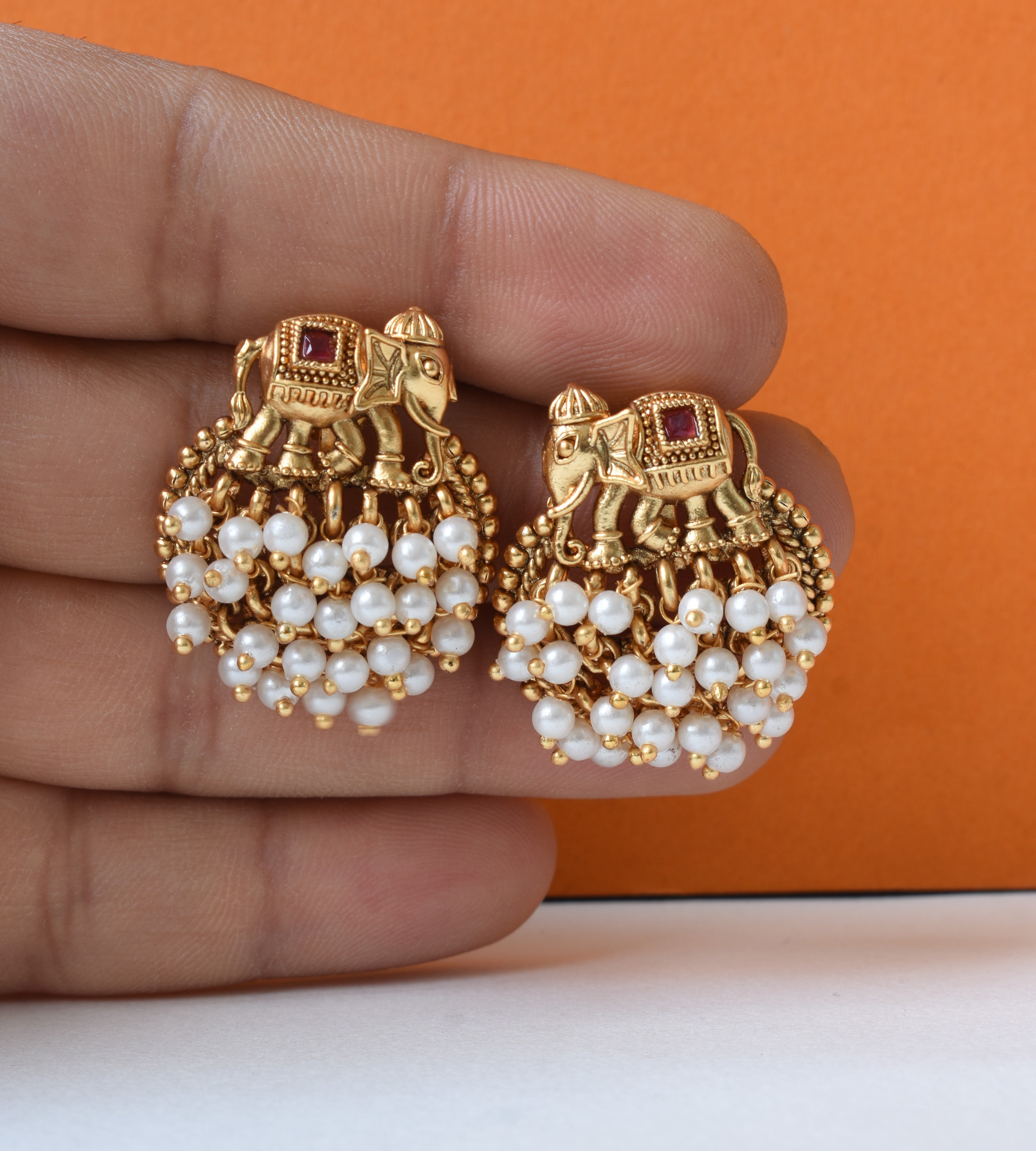 Traditional Elephant Motif Stud Earrings with Pearl Clusters