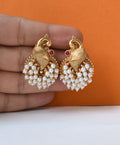 Traditional Peacock Motif Stud Earrings with Pearl Clusters