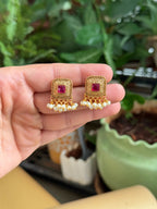 Pearl necklace with ruby centre stone and earrings