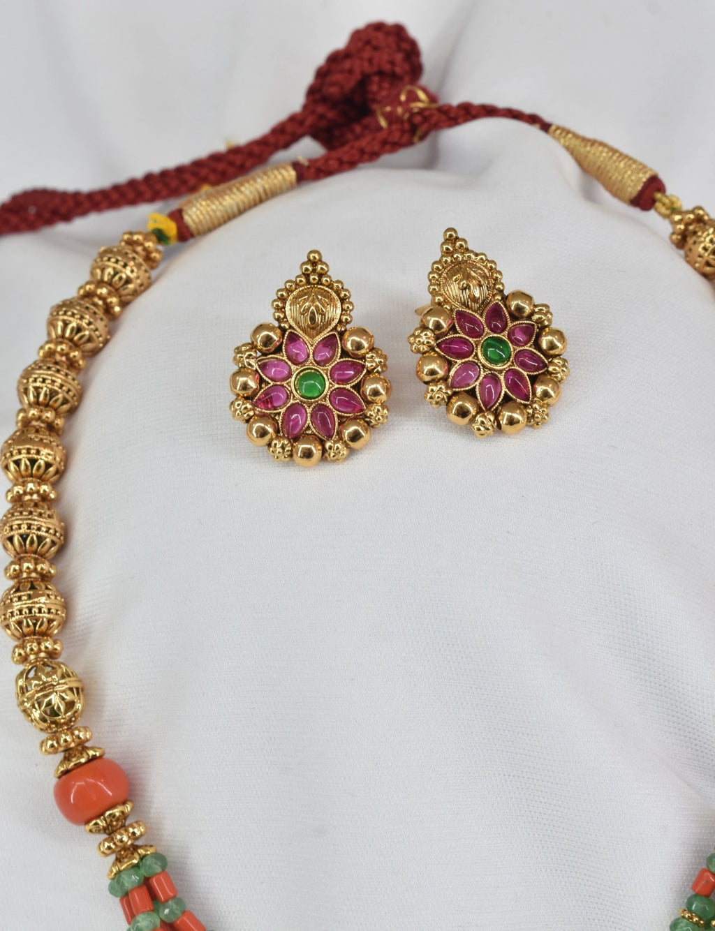 Varnika 6.0 (Temple-Inspired Gold-Toned Necklace Set with Bead Detailing)