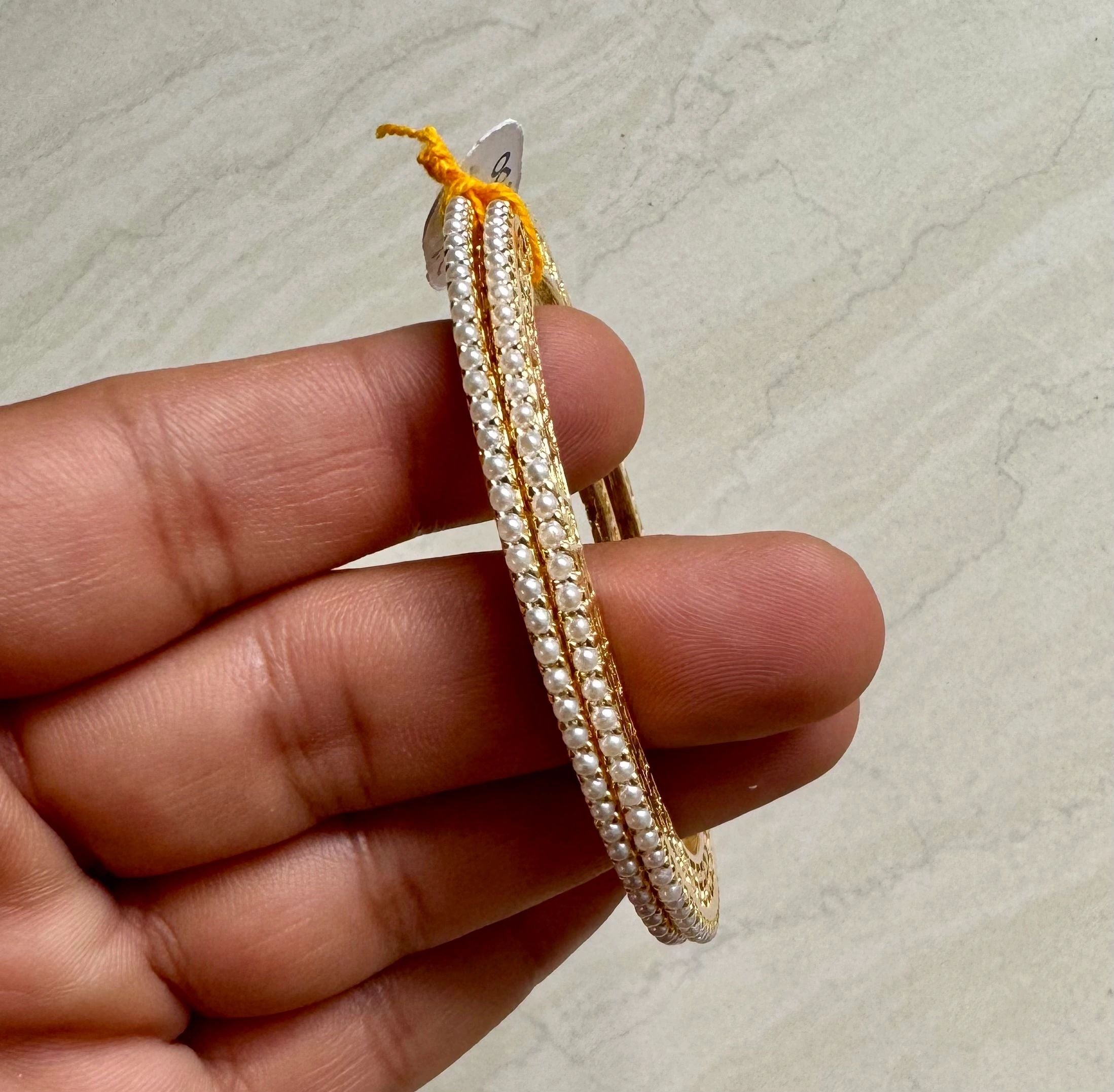 Delicate Pearl Bangles