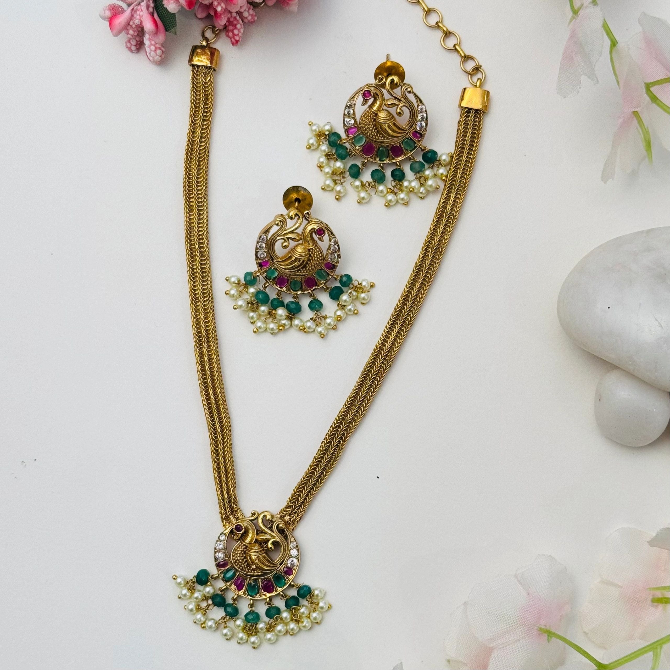 Gold forming peacock necklace set