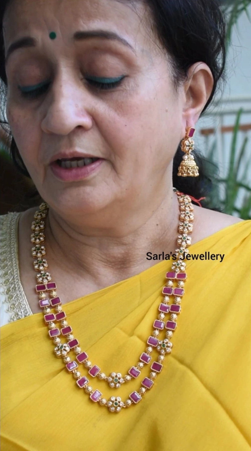 Long layered necklace with jhumkas